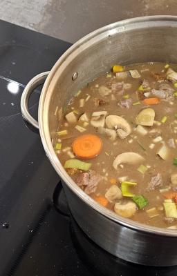 a pot full of beef stew